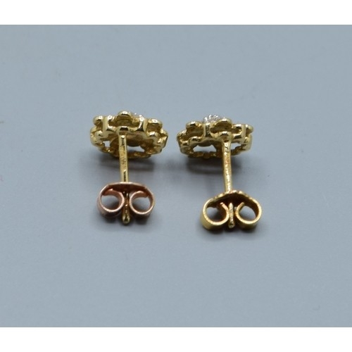 2615 - Pair of vintage 9ct gold and Diamond floral studs, 9mm diameter