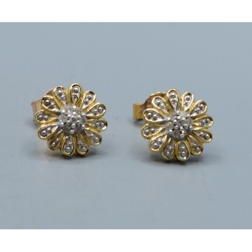 2615 - Pair of vintage 9ct gold and Diamond floral studs, 9mm diameter