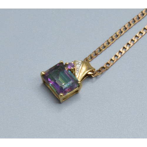 2583 - 9ct gold Mystic Topaz and & Diamond pendant 14x9mm held on a 9ct gold neck chain 44cm long 4.1gr... 