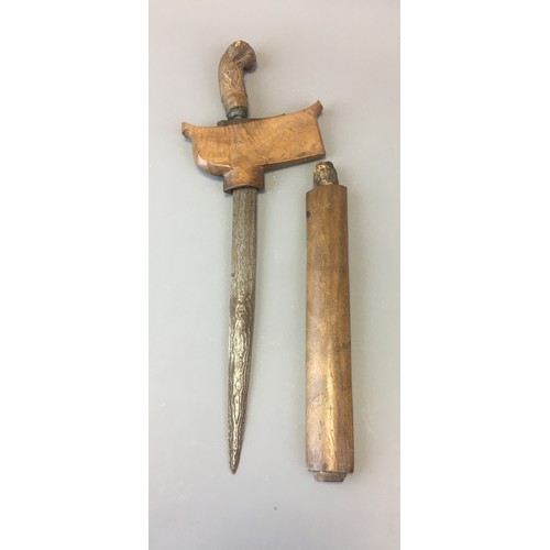 37 - Indonesian Kriss Dagger with Damascus Steel Blade and Carved Handle.