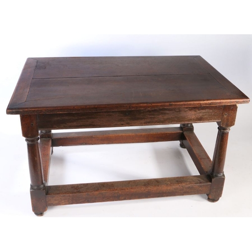 63 - 18th Century and later oak table, the two plank top raised on turned legs and substantial square str... 