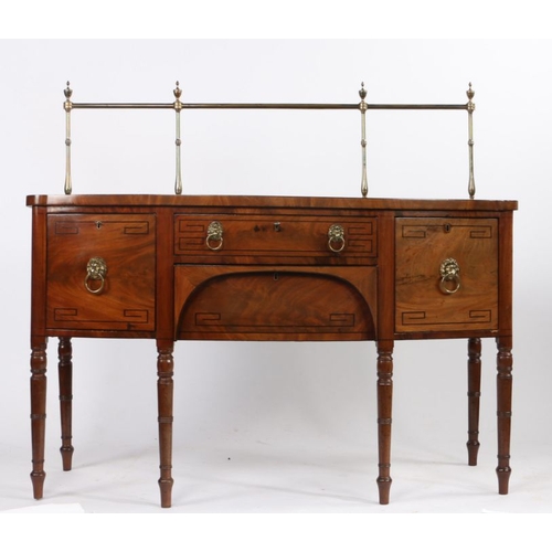 74 - Regency mahogany sideboard, the brass back rail with urn finials, the bow-front sideboard with centr... 