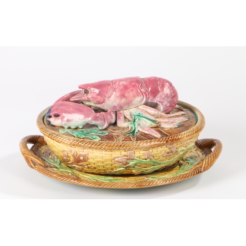 16 - A Majolica lobster tureen and stand by George Jones, Circa 1880. Tureen and stand both decorated wit... 