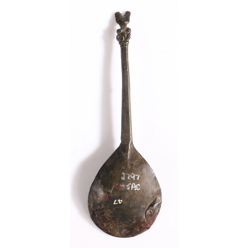 10 - A rare mid-15th century latten horned-headdress knopped spoon, English, circa 1450

 The flattened h... 