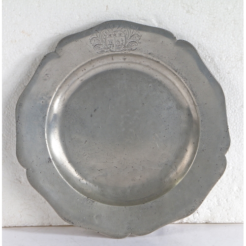 107 - David Garrick interest: A George II pewter wavy-edge plain rim plate, circa 1755

 The rim with five... 