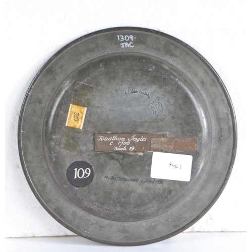 109 - A good Queen Anne pewter multiple-reeded rim and all-over hammered plate, circa 1706

 London label ... 