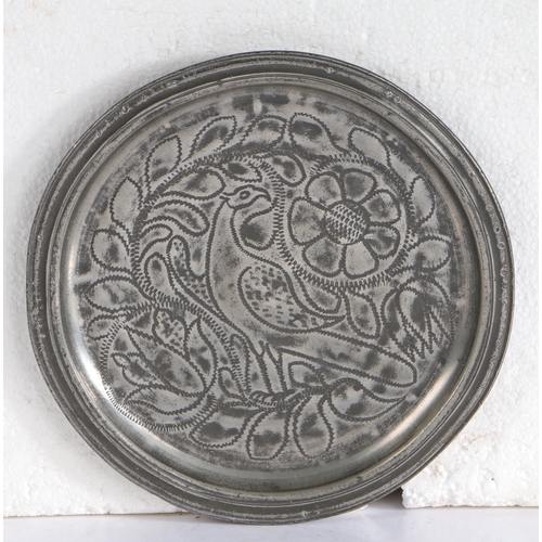 111 - A good William & Mary pewter wrigglework narrow rim plate, circa 1700

 The well designed central fi... 
