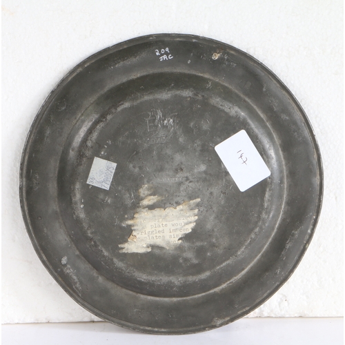 117 - A rare George II pewter wrigglework plate, Hampshire, circa 1735

 Having a single reed rim designed... 