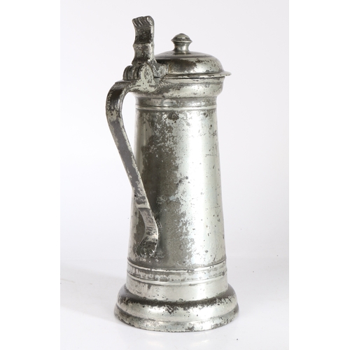 118 - A good James I pewter flagon, circa 1610-20

 The tapering drum with single narrow fillet below coll... 