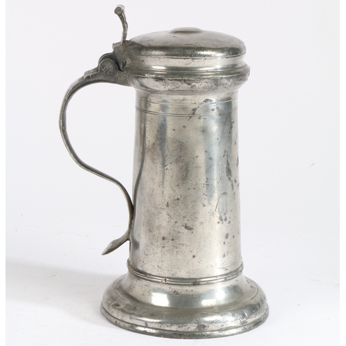 126 - A Charles I pewter flagon, circa 1640

 Having a tapering straight-sided drum with paired incised li... 