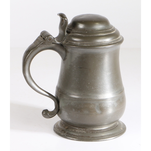 14 - A George I OEAS quart dome-lidded tulip-shaped tankard, circa 1730

 Having a single low fillet to d... 