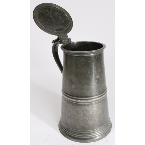 146 - A George III pewter flat-lid flagon, Scottish, circa 1785-1800

 Having a truncated cone body with m... 