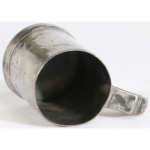 156 - A George III pewter OEWS pint mug, circa 1820

 Having a plain truncated cone drum, moulded footrim ... 