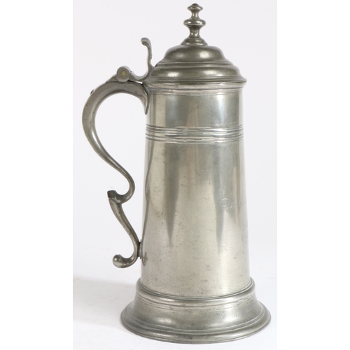 165 - A George III pewter spire flagon, dated 1769

 Having a domed lid with pagoda-type knop, a tear-drop... 