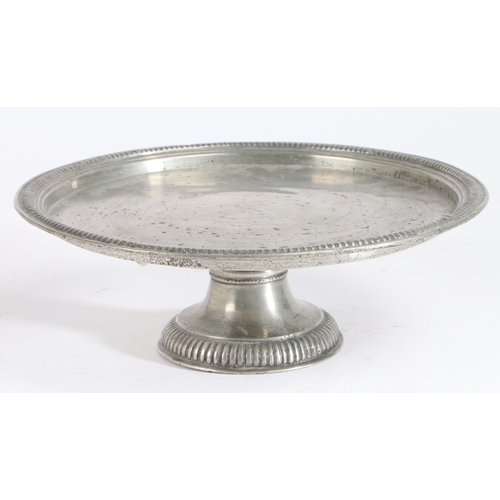 169 - A rare Queen Anne pewter tazza or footed plate, circa 1705

 The flat plate with narrow beaded rim, ... 