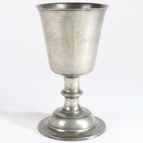 176 - A large George III pewter communion cup, Scottish, circa 1800

 The deep flared and straight-sided b... 