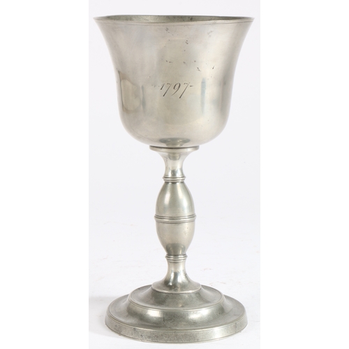 183 - A large George III pewter communion cup, dated 1797

 The bowl with flared lip engraved 1797, on a... 