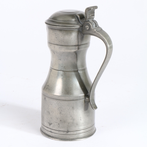 214 - A George III pewter mutchkin tappit hen, Glasgow, circa 1800

 The body of typical shouldered form, ... 