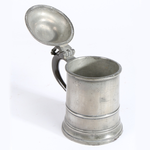 221 - A George III pewter OEAS pint domed-lidded tankard, circa 1800-20

 The straight-sided tapering drum... 