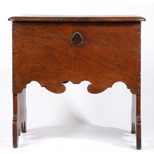 256 - A highly unusual William & Mary oak boarded box-stool, circa 1690

 Having a sliding one-piece top w... 