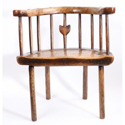 273 - A George III primitive ash and elm comb-back Windsor armchair, Welsh, circa 1780

 With horse-shoe s... 