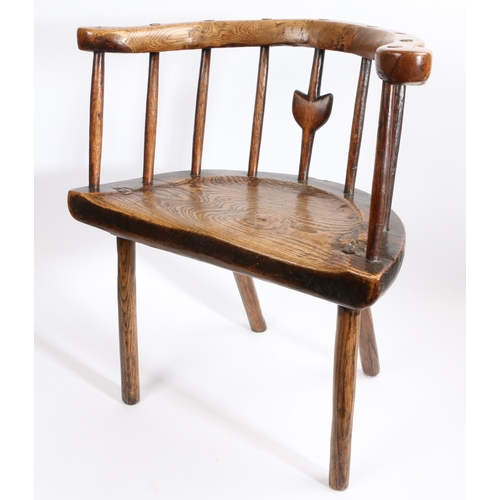 273 - A George III primitive ash and elm comb-back Windsor armchair, Welsh, circa 1780

 With horse-shoe s... 