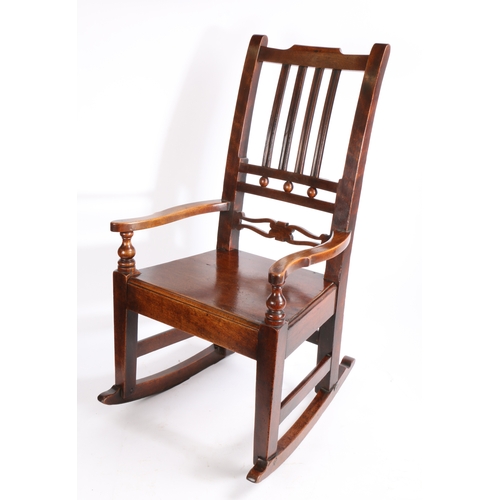 276 - An early 19th century fruitwood, mahogany and alder wood childs rocking chair, East Anglia, circa 1... 