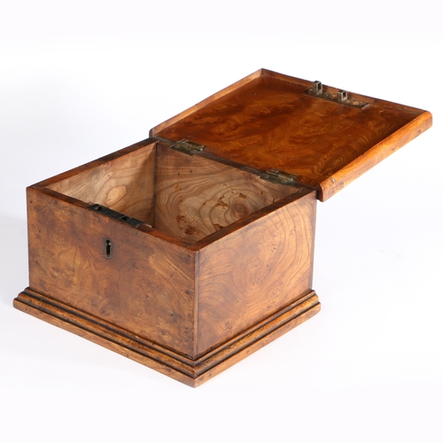 291 - A well-figured elm board box

 The one-piece lid with simple applied narrow edge moulding, plain sid... 