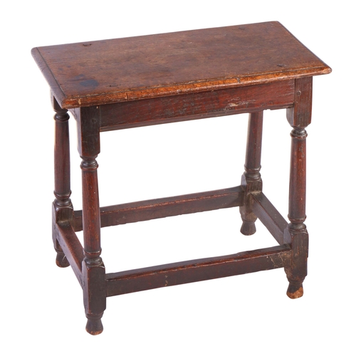 305 - A William and Mary oak joint stool, circa 1690

 Having an ovolo-moulded top, plain rails with lower... 