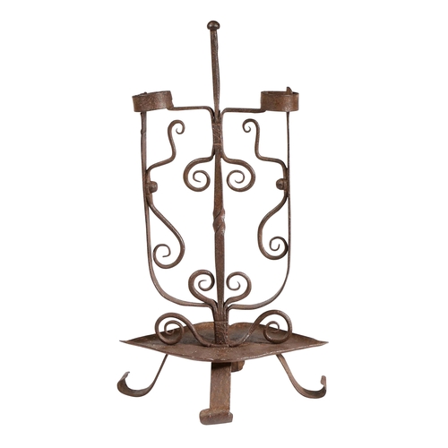 325 - A wrought iron double rushlight or peerman, Scottish

 Possibly 19th century,  having a ball knopped... 