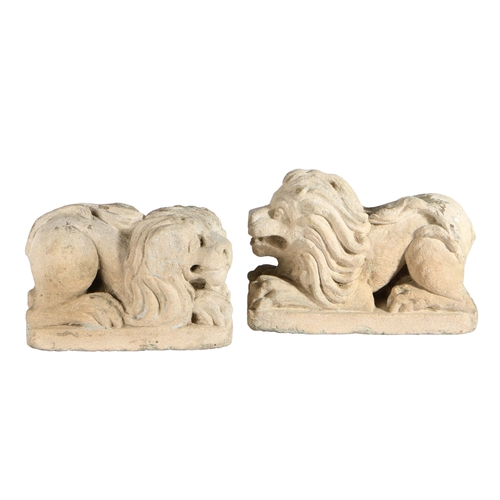 338 - An interesting pair of late 16th century limestone carved recumbent lions, circa 1600

 Each with op... 