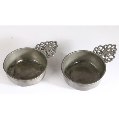 34 - A rare pair of William & Mary pewter porringers, circa 1700

 Each having a straight-sided bowl, fla... 