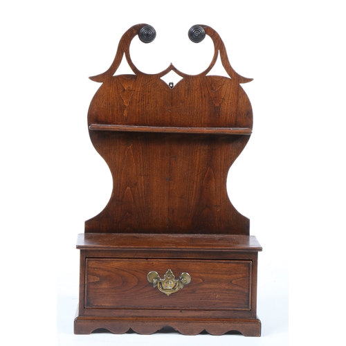 355 - A George III cherrywood mural spoon rack

 The heart-shaped backplate with a fretwork broken swan-ne... 