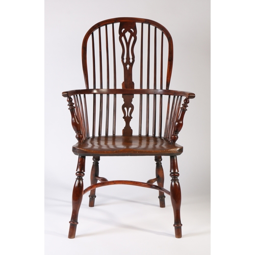 360 - A Victorian yew Windsor armchair, North East Midlands, circa 1850 

The high hooped back with four l... 