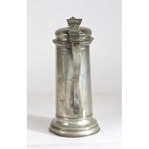 40 - A large and impressive Charles I pewter flagon, circa 1630

 Having a plain drum with ovolo footrim,... 