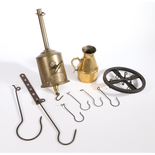 446 - A late 19th century brass spit engine or bottle jack, English

 Marked BENETFINK & Co, IRONMONGERS ... 