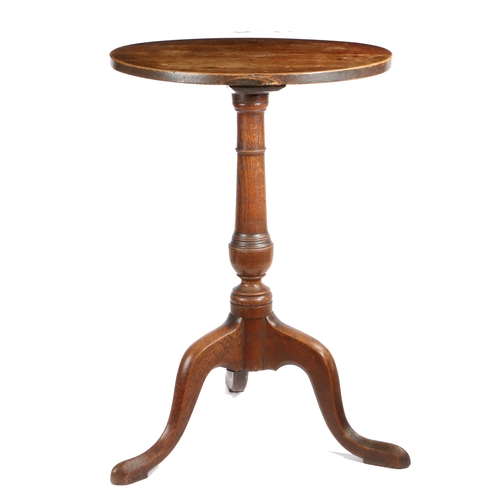 496 - A George III ash and oak tripod table, circa 1780

 Having a fixed, one-piece, circular ash top, on ... 