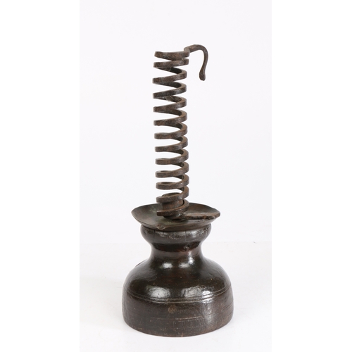 502 - A wrought iron and well-patinated fruitwood spiral candleholder, Anglo-French, circa 1800

 The hold... 