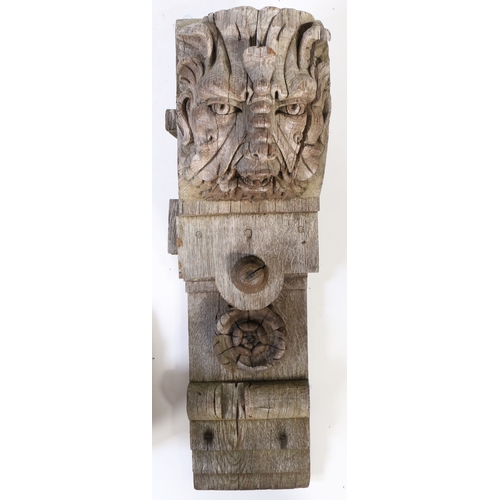 659 - A large 19th century oak corbel, in the 16th century manner

 Carved with a Green Man mask, topped b... 