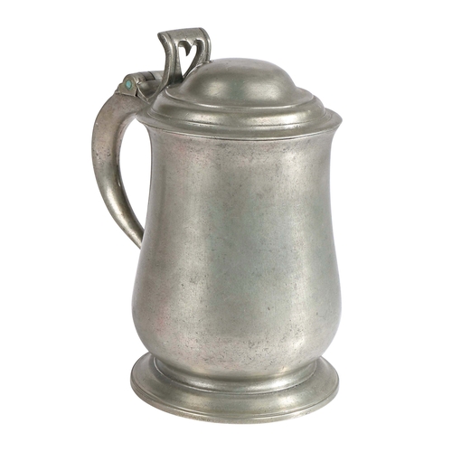 74 - A George II pewter OEAS quart dome-lidded tulip-shaped tankard, circa 1740

 With plain body, pierce... 