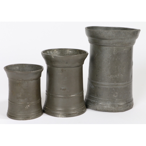 88 - A George III pewter OEWS quart straight-sided mug, converted to Imperial capacity by extending the l... 