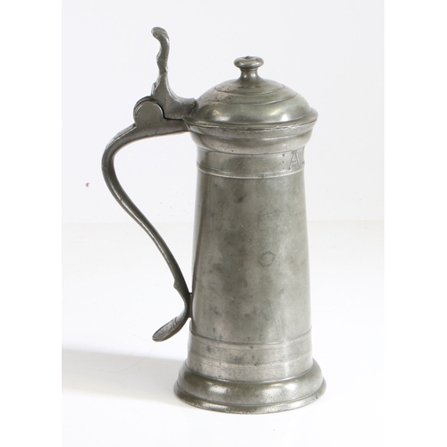 94 - A rare 'James I' pewter flagon, unusually with touchmark and cast decoration, dated 1629

 Having ... 