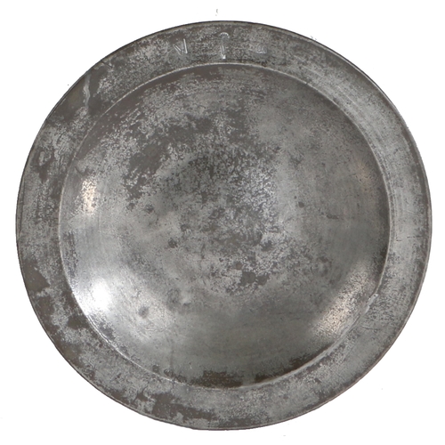 106 - A rare and fine mid-16th century pewter dish, English, circa 1550

 The plain rim with triangular be... 