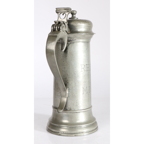 121 - A good and rare Charles I pewter flagon, with rare inscription, circa 1630

 Having a knopped bun li... 