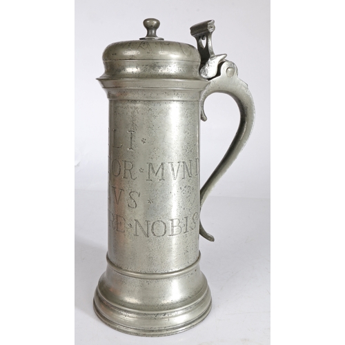 121 - A good and rare Charles I pewter flagon, with rare inscription, circa 1630

 Having a knopped bun li... 