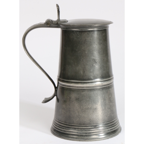 146 - A George III pewter flat-lid flagon, Scottish, circa 1785-1800

 Having a truncated cone body with m... 