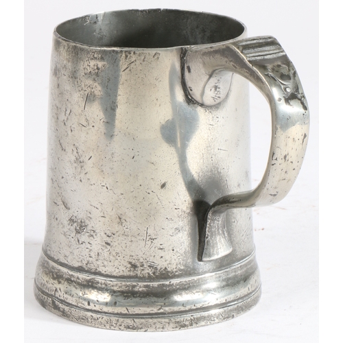 156 - A George III pewter OEWS pint mug, circa 1820

 Having a plain truncated cone drum, moulded footrim ... 
