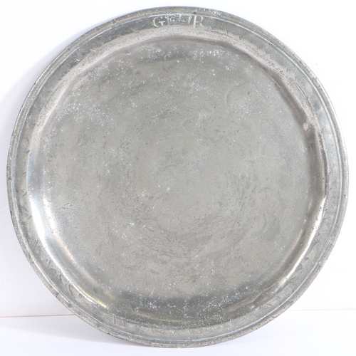 157 - Chelsea Hospital Interest: A George II pewter single reed narrow rim plate, circa 1740

 The rim eng... 