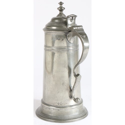 165 - A George III pewter spire flagon, dated 1769

 Having a domed lid with pagoda-type knop, a tear-drop... 