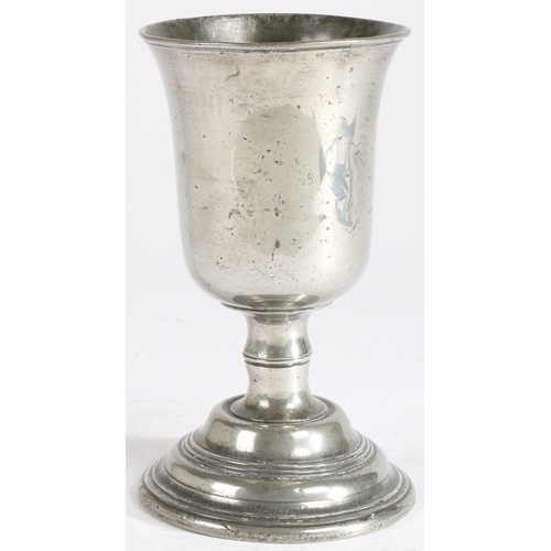 171 - A George III pewter communion cup, circa 1780

 Having a deep and wide bowl with flared rim, addorse... 